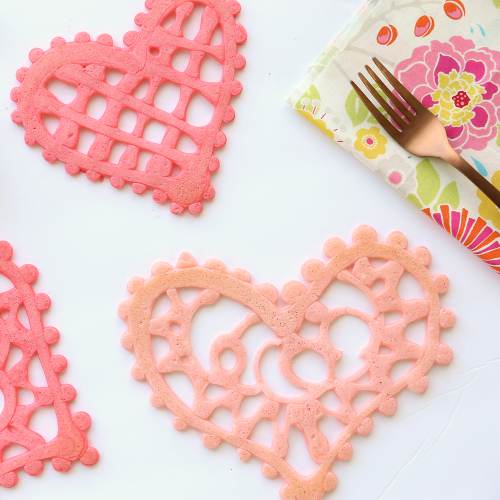 Lace heart shaped pancakes are a fun breakfast idea for Valentine's Day! Valentines recipe to make with kids.