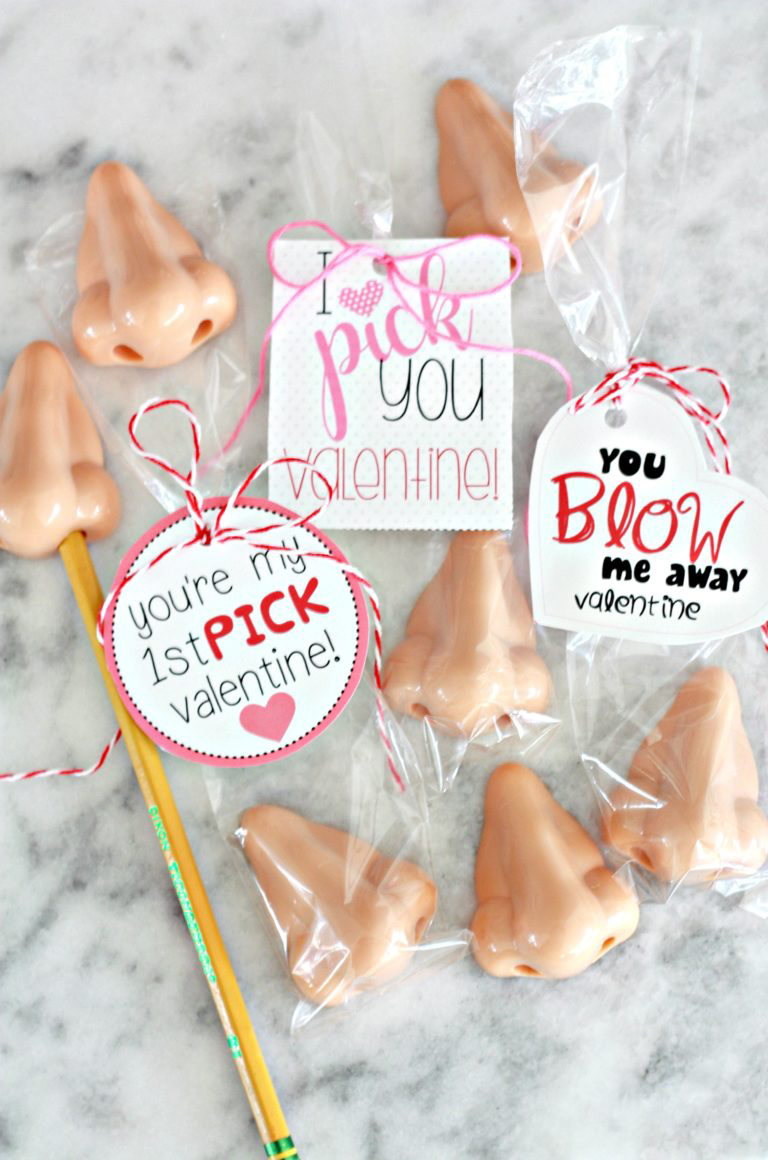 Plastic nose pencil sharpeners with Valentine\'s day tags that say I pick you