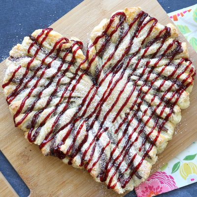 This raspberry nutella puff pastry heart is an easy Valentine's dessert everyone will love! Quick and easy recipe.