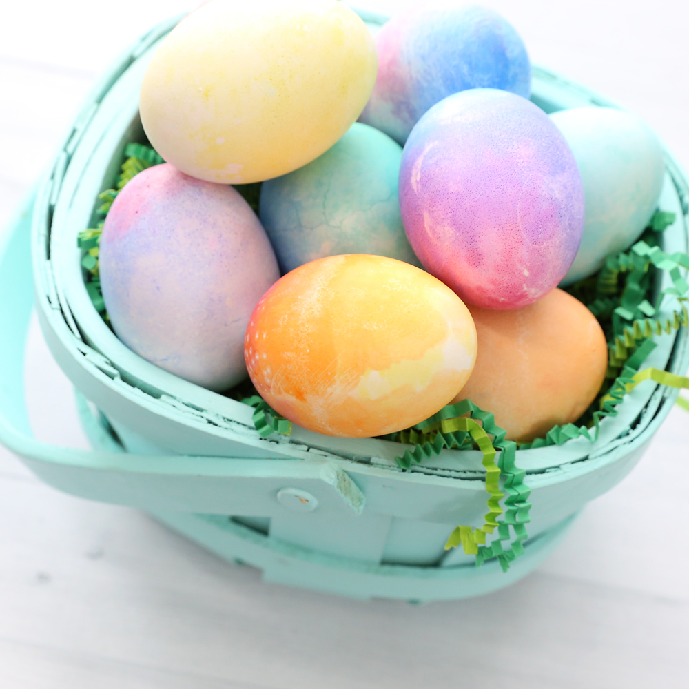 Watercolor Easter eggs in a basket