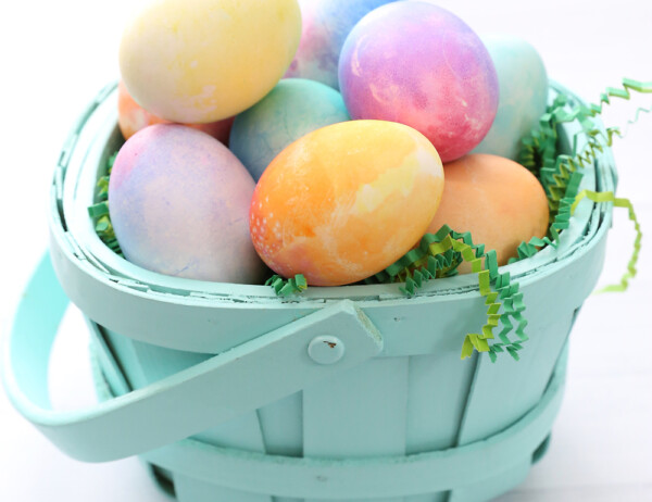 Watercolor Easter eggs in a basket