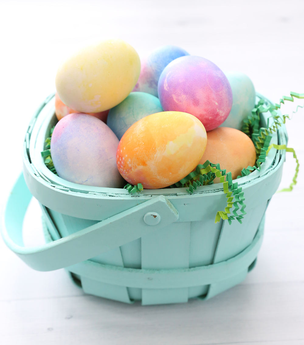 Watercolor Easter eggs in a basket
