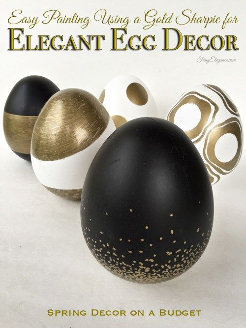Eggs decorated with black white and gold pens