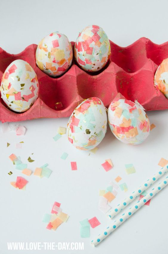 Easter eggs decorated with small squares of confetti