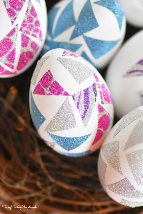 Easter eggs decorated with pieces of washi tape