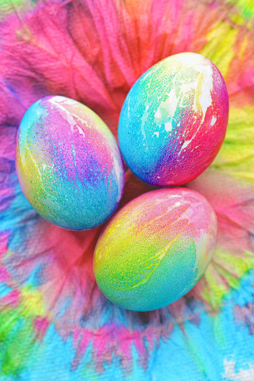 Tie dye Easter eggs on a tie dyed napkin