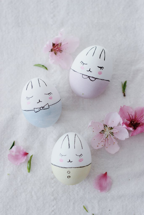 Cute Easter eggs decorated to look like little bunnies