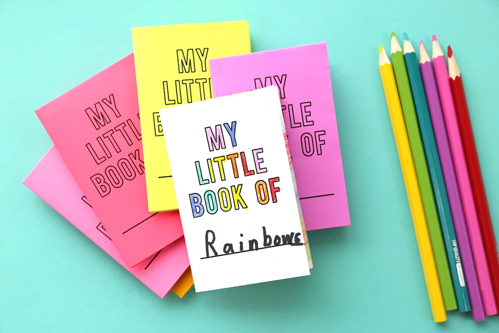 Stack of little paper books in different colors