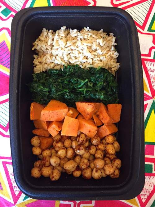 Vegan buddha bowl in a plastic meal prep container