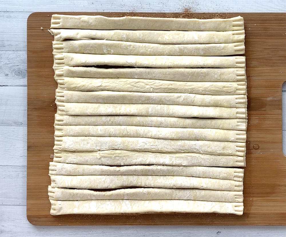 Pastry sheet cut into long strips