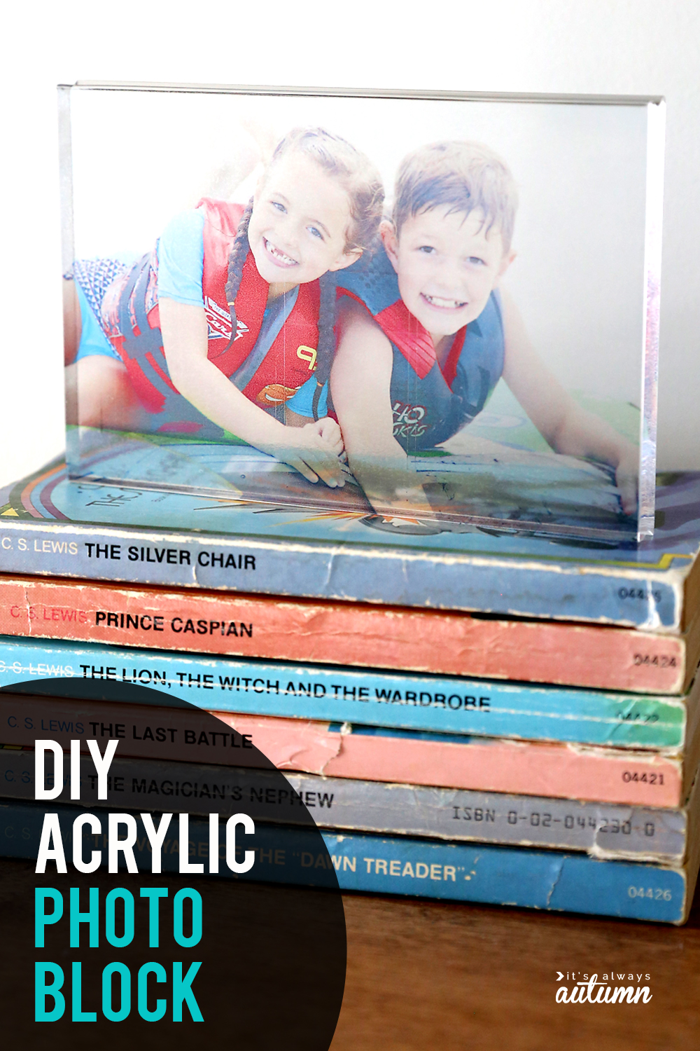 Acrylic photo block with picture of sister and brother in life jackets on it