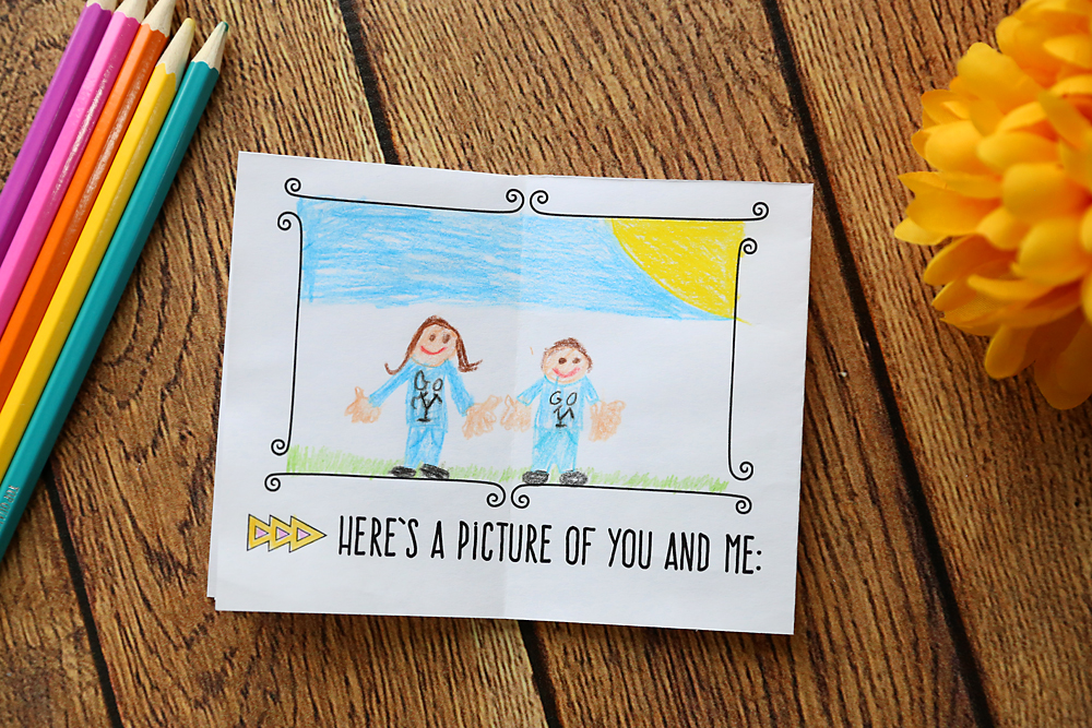 Inner page of Mother\'s day card that says Here\'s a picture of your and me with a drawing