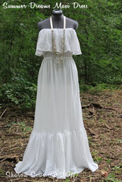 Long white summer maxi dress on a mannequin