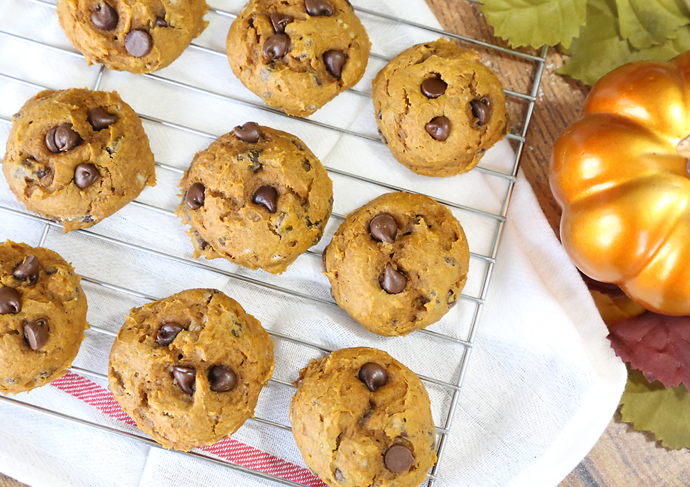 Pumpkin chocolate chip cookies on a cooling rack