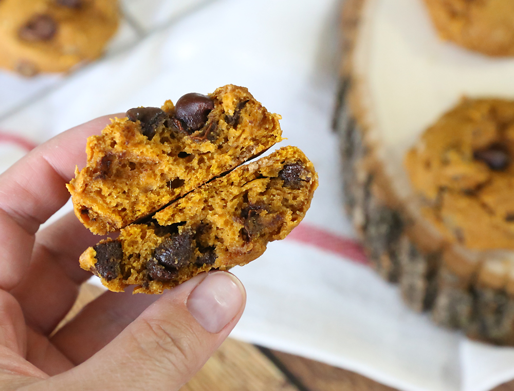 Pumpkin chocolate chip cookie broken in half