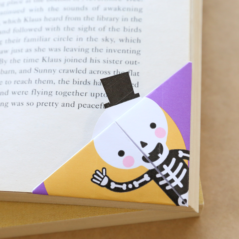 Halloween corner bookmarks with a skeleton on it