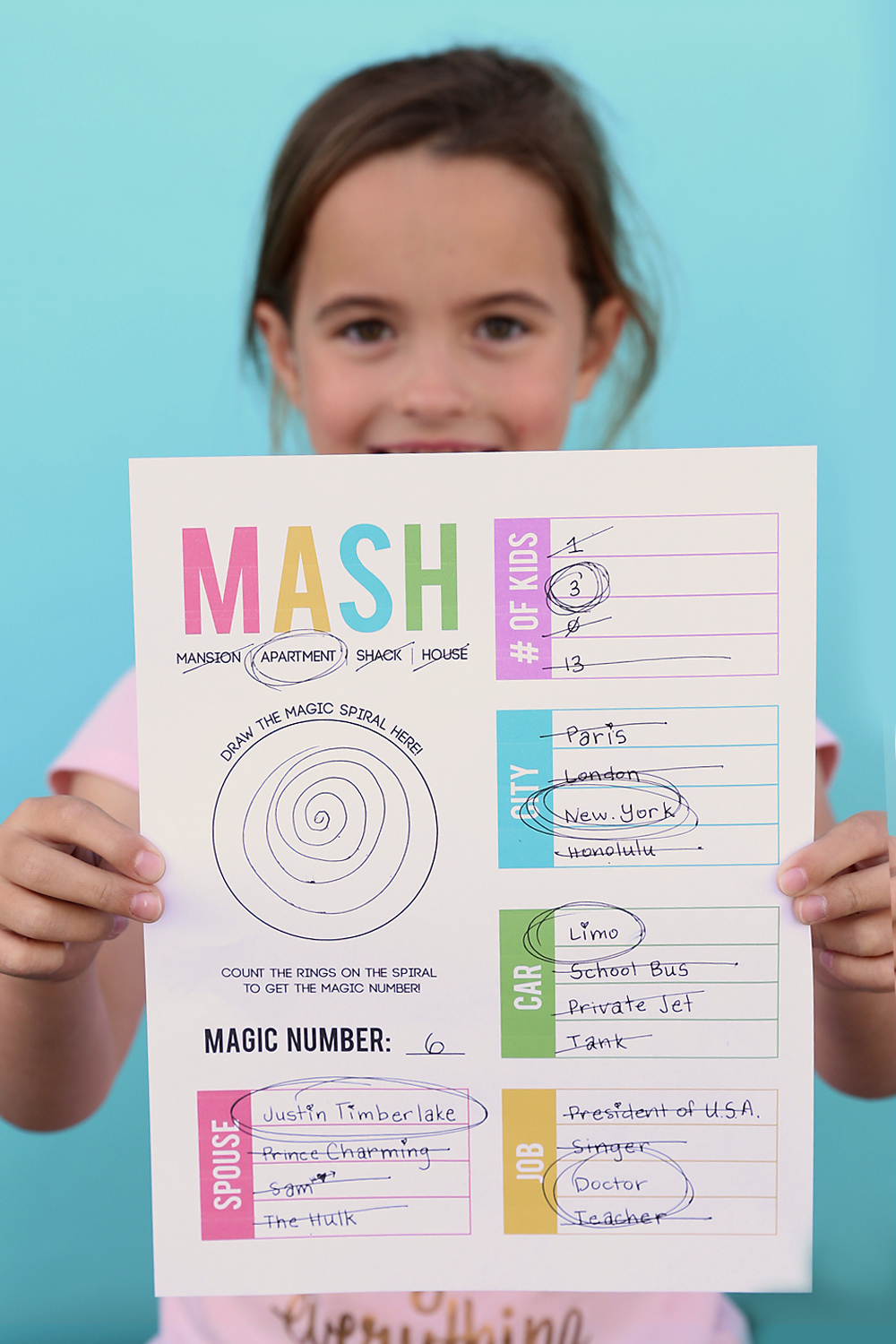 Girl holding MASH game print out