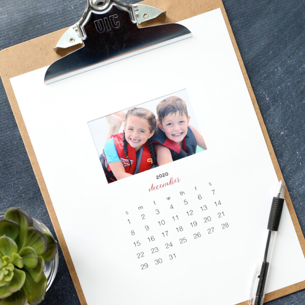 Printable photo calendar on a clipboard