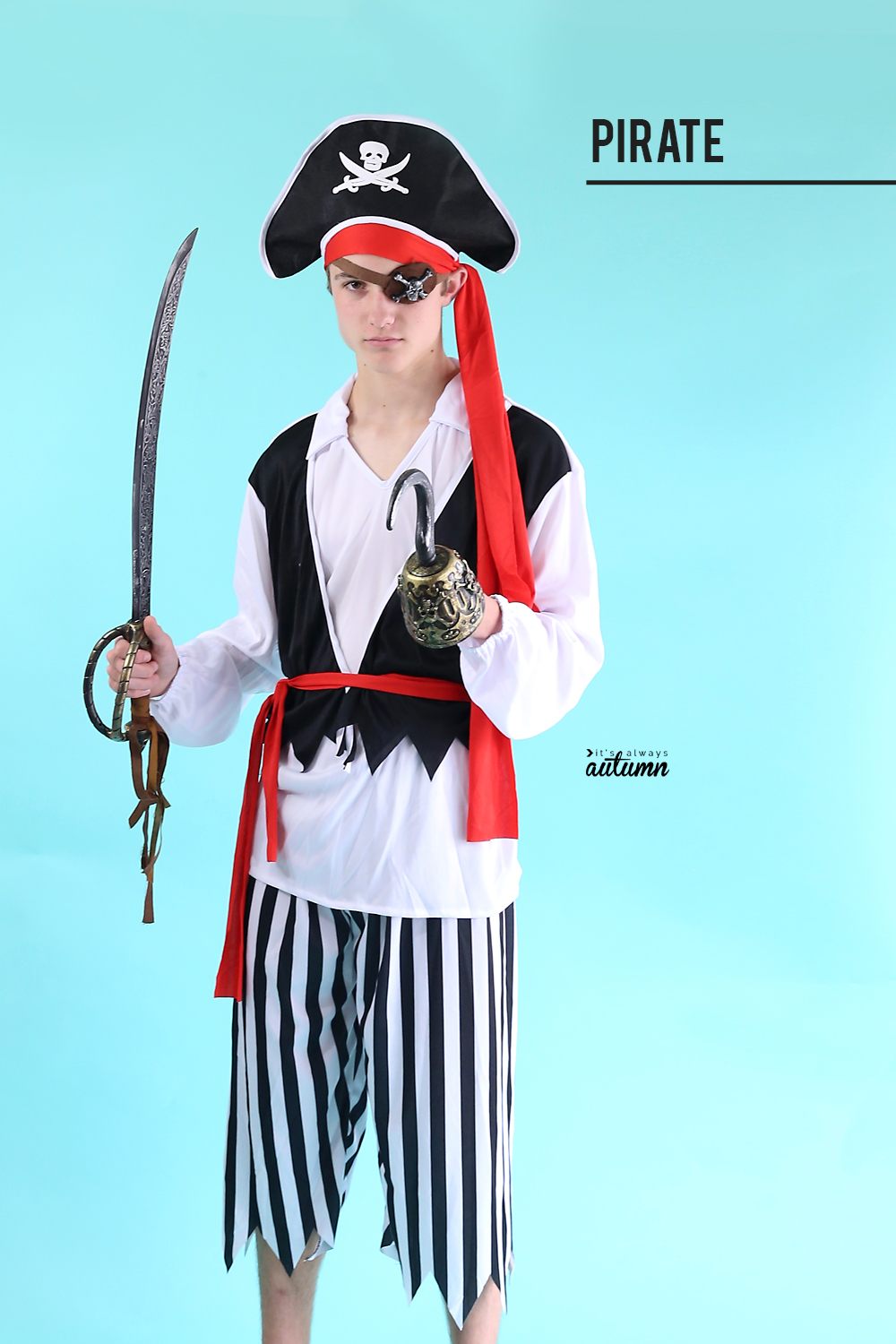 Teen boy dressed in pirate Halloween costume