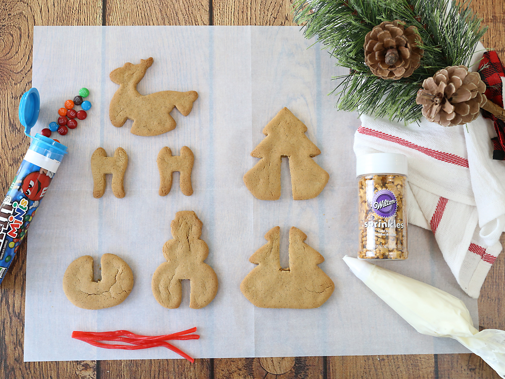 3D gingerbread cookie pieces with frosting and decorations