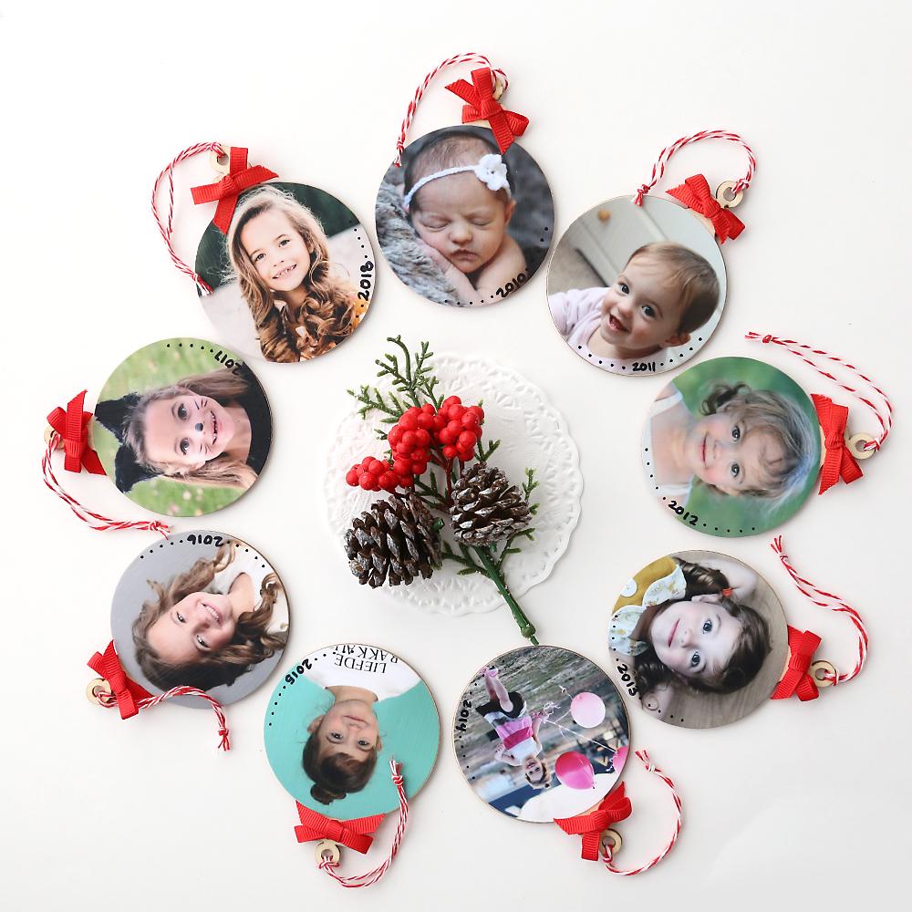 DIY photo ornaments with pictures of a little girl, one for each year