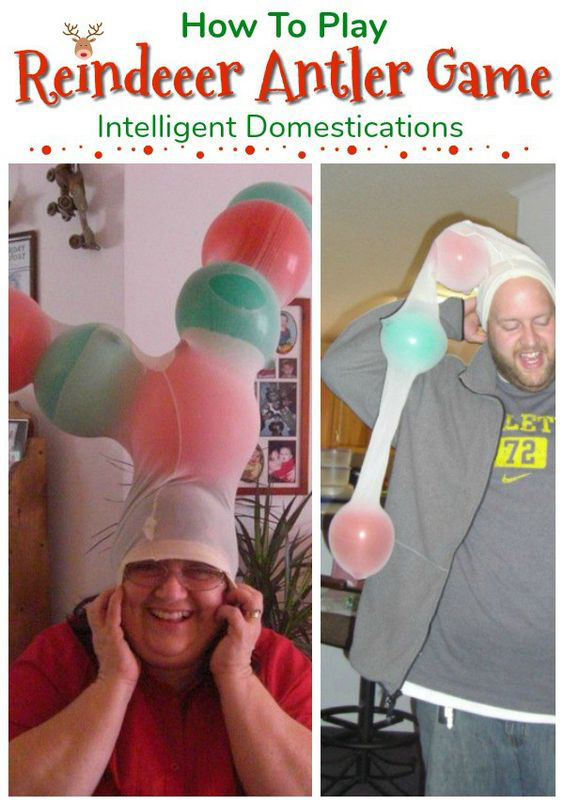 Reindeer antler Christmas game: people wearing pantyhose stuffed with balloons on their heads