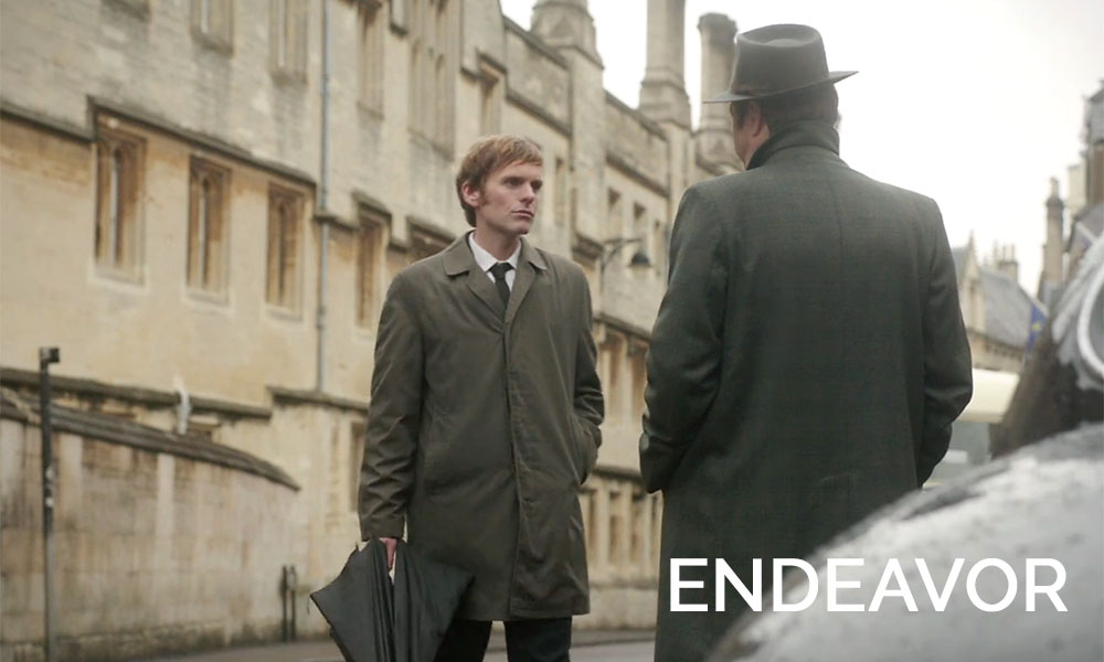 Two detectives standing in a road in Endeavor