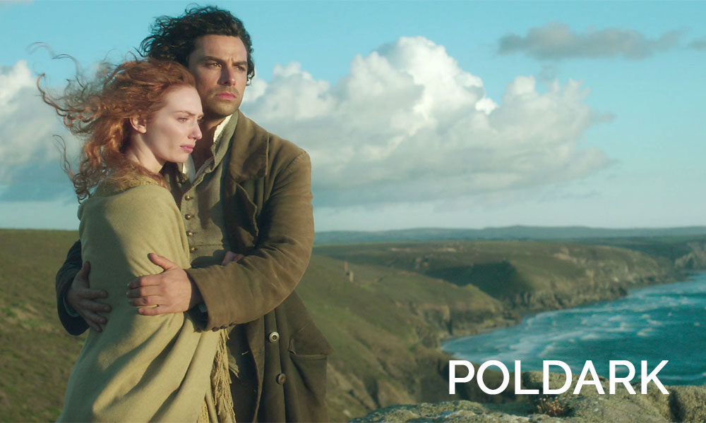 Eleanor Tomlinson, Aidan Turner are posing for a picture in Poldark