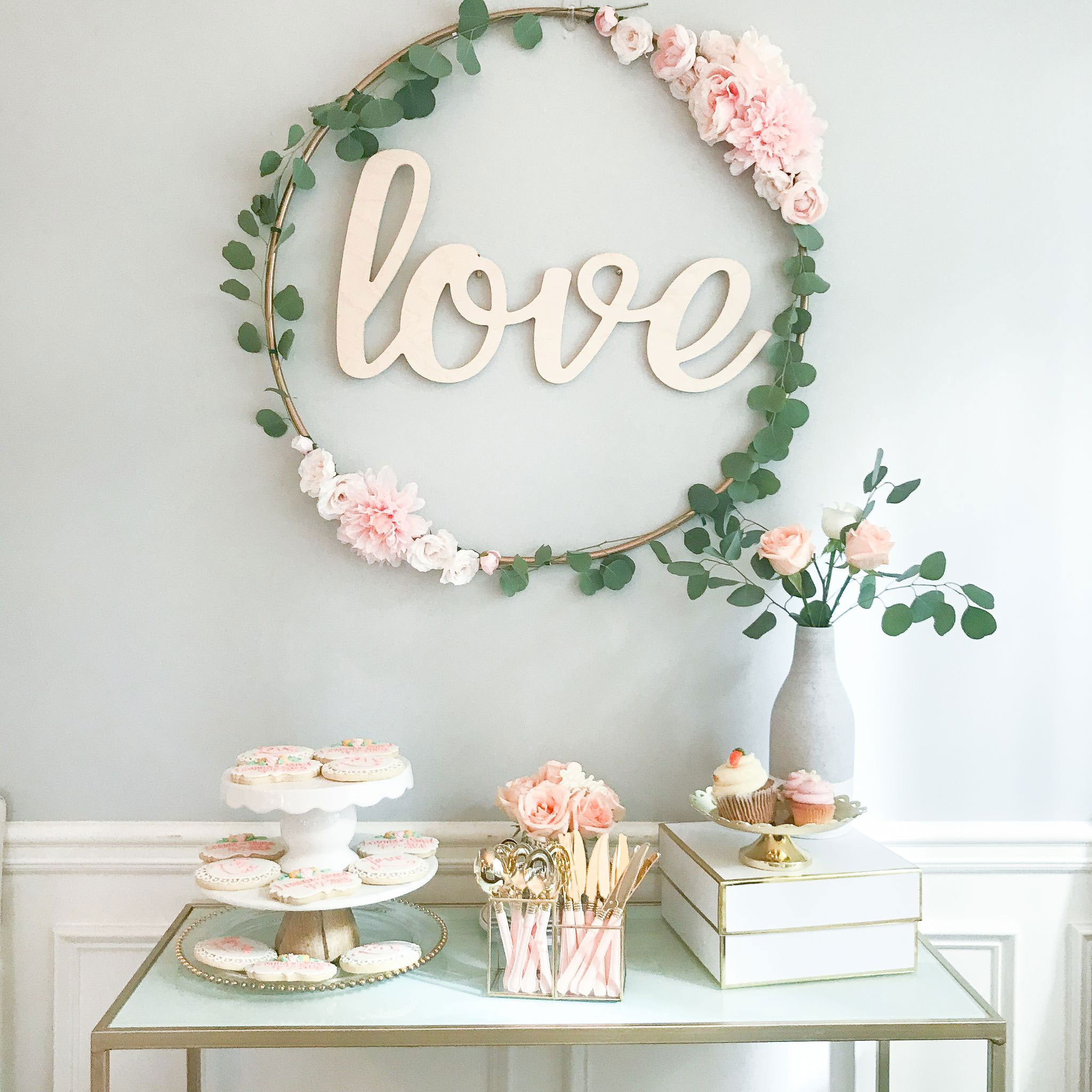 Large hula hoop wreath with "love" letters
