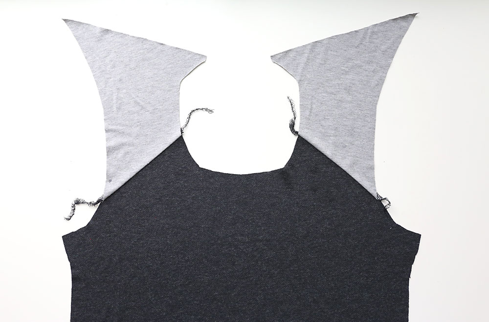 Shirt front piece with shoulder pieces sewn to it