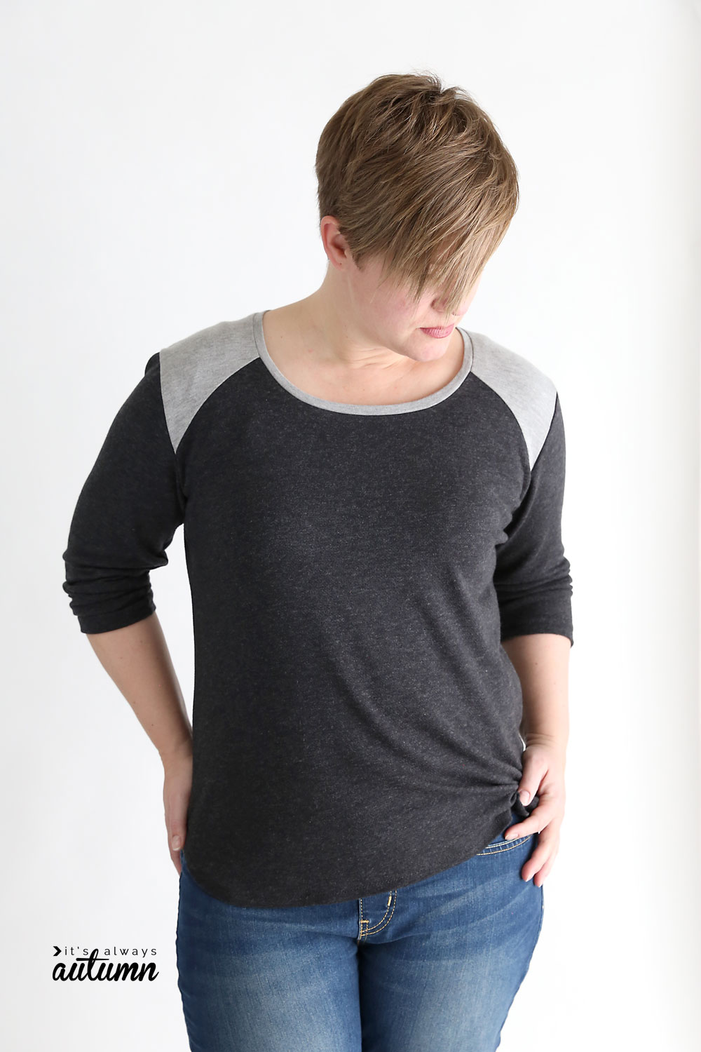 Woman wearing long sleeve t-shirt with contrast shoulder panels