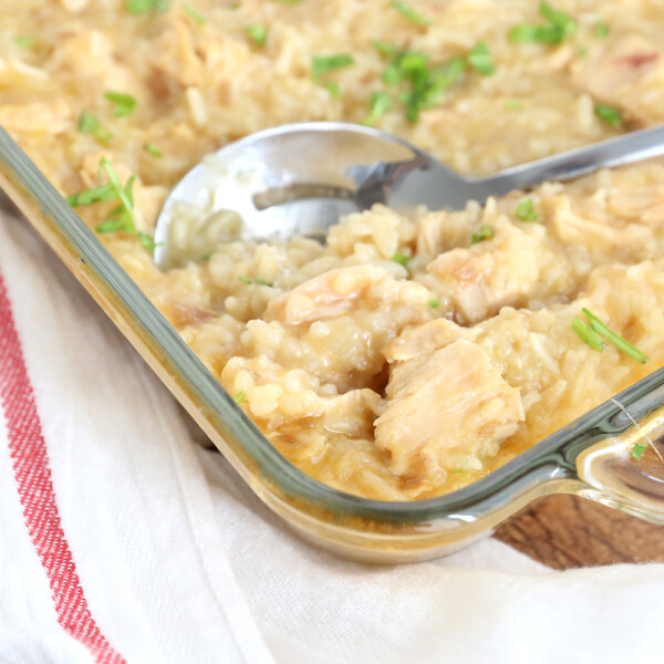 Chicken and rice casserole with a large spoon