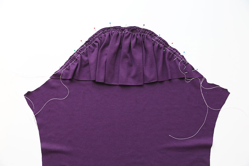 Ruffle piece pinned to shoulder piece