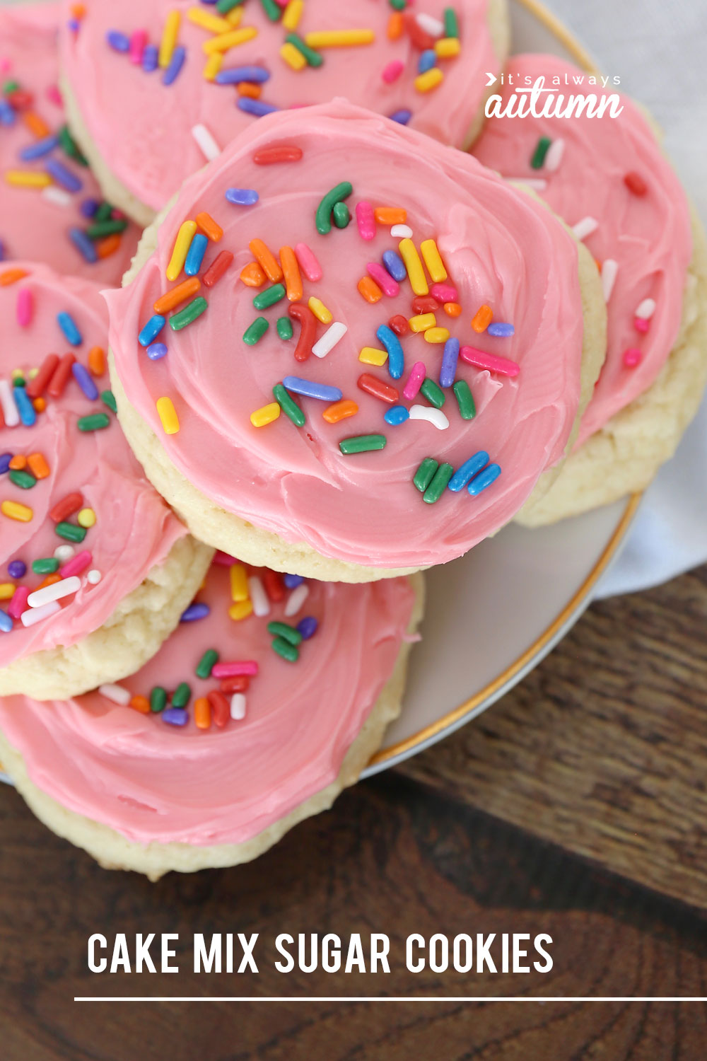 Sugar cookies made from a cake mix with pink frosting and sprinkles