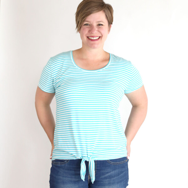 A woman wearing the Waist Tie T-Shirt made from a free sewing pattern
