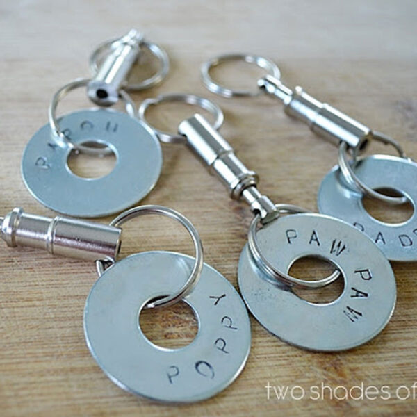 Keychains stamped with names.