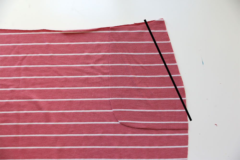 Skirt pattern piece with pocket pattern piece laid on top
