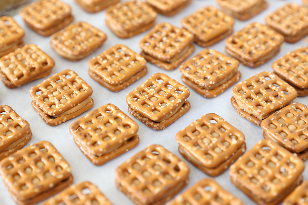 Pretzels sandwiched around caramel