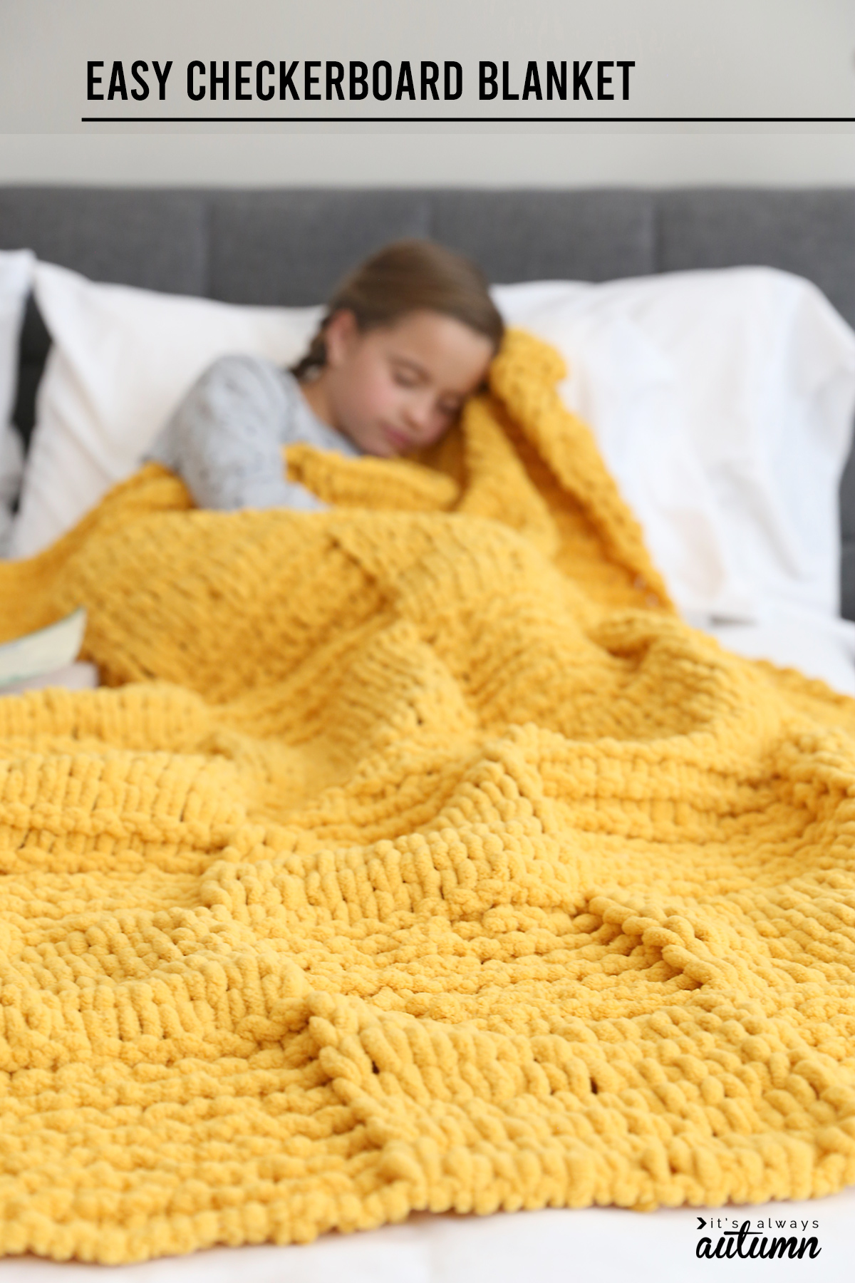 Pretty yellow blanket made with loop yarn.