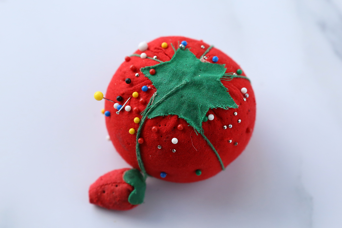 Sewing supplies: pins and pincushion