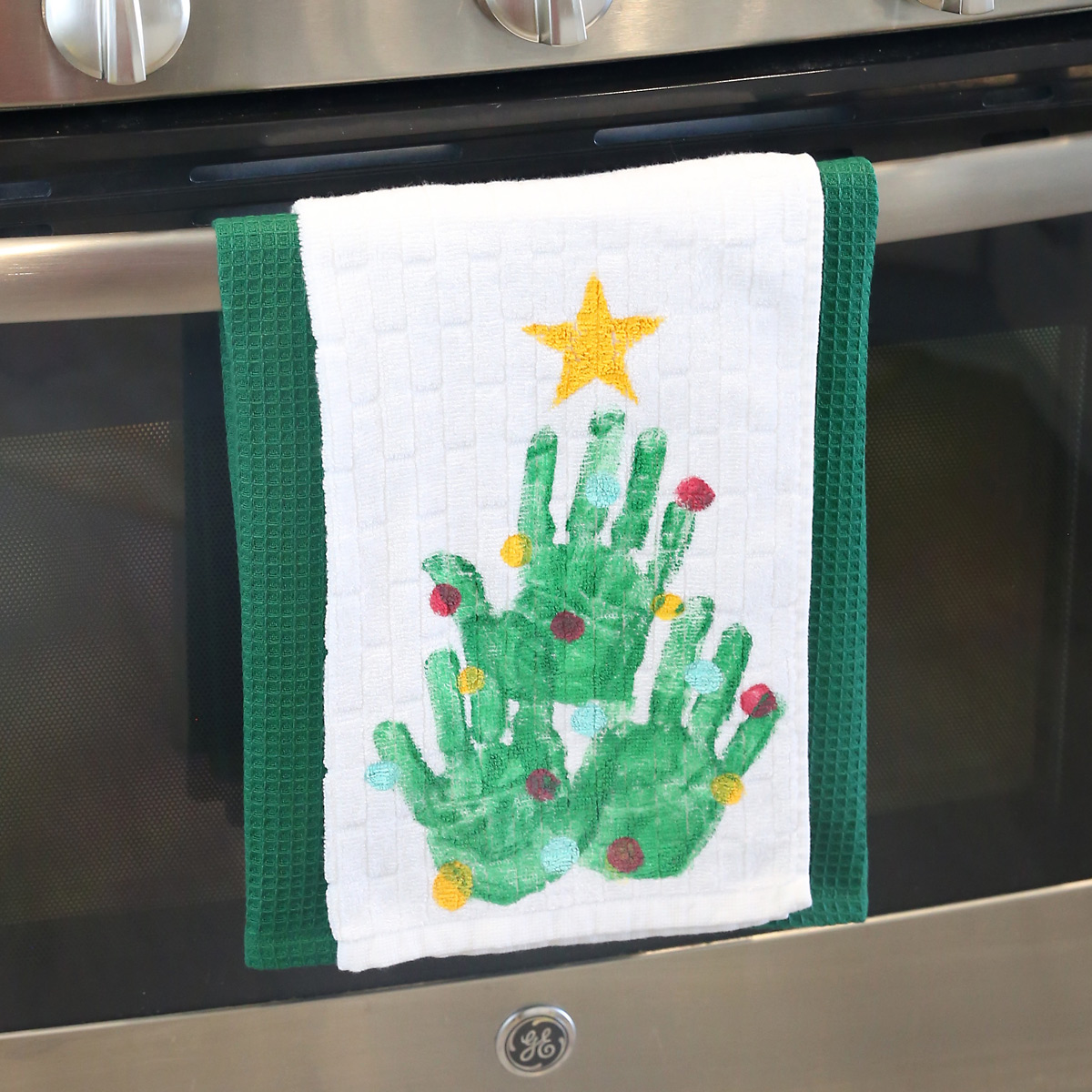 Handprint Christmas tree kitchen towel