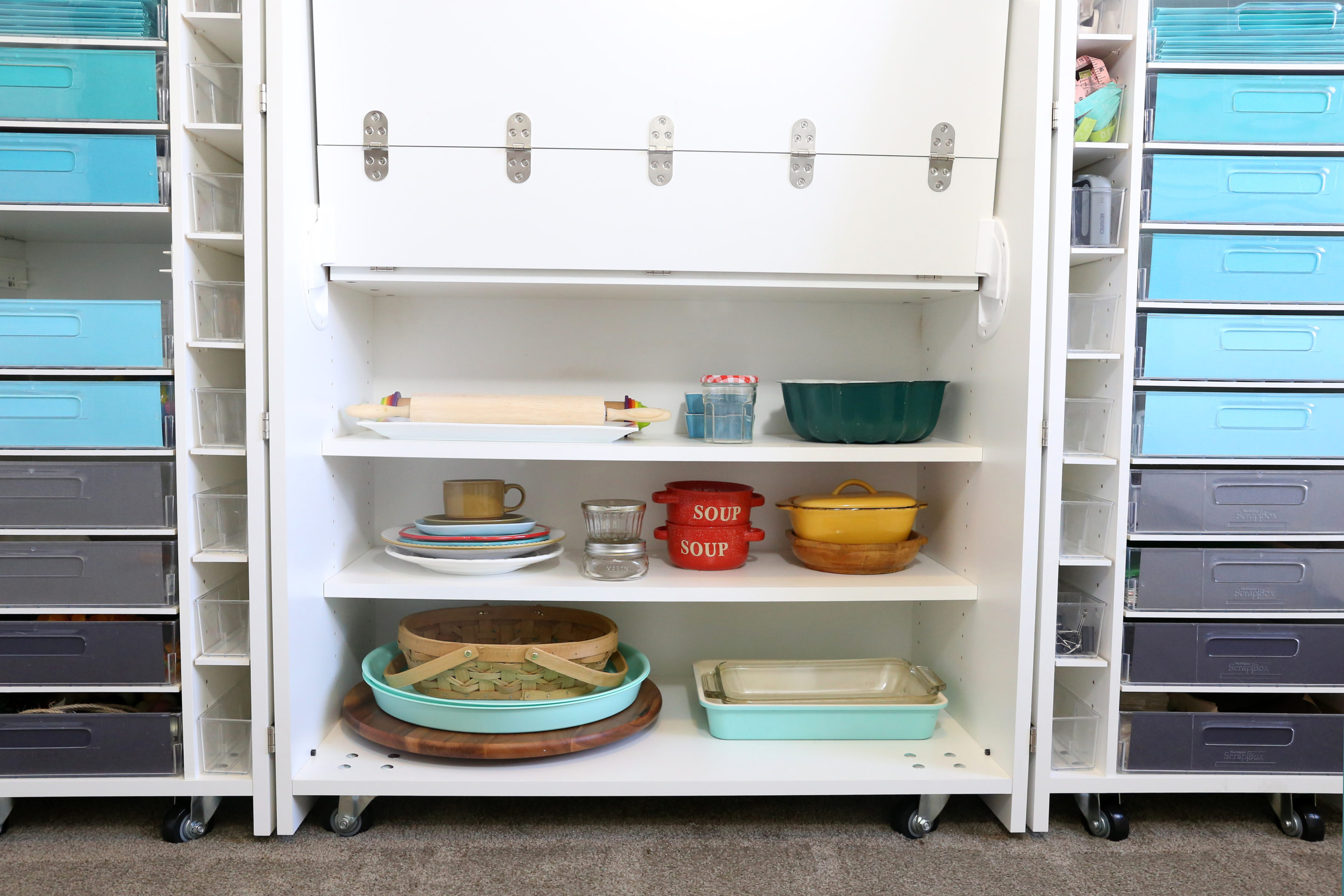 Bottom shelving on a DreamBox full of dishes