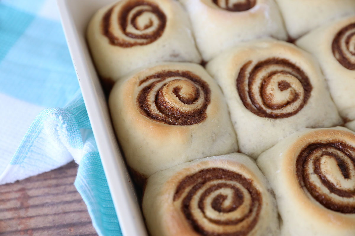 When baked, cinnamon rolls are golden brown on top