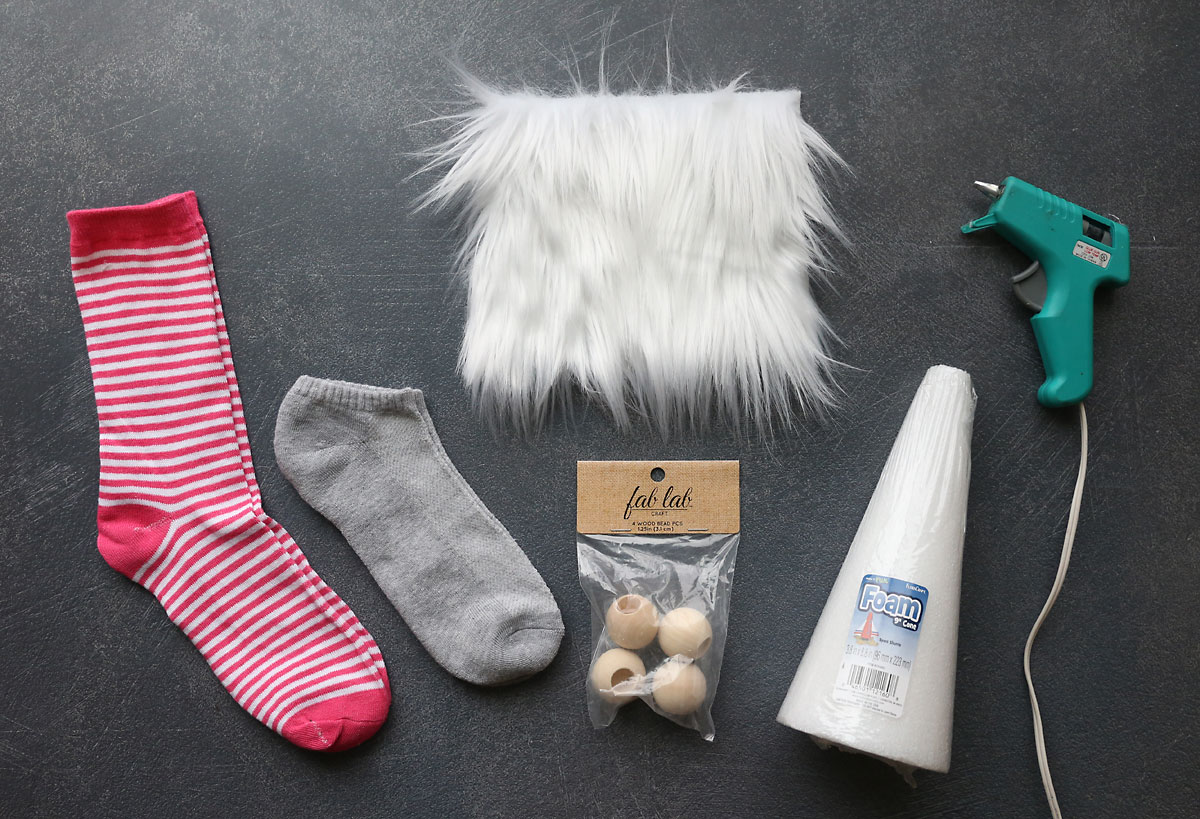 Sock gnome supplies: Foam cone, faux fur, wood bead, plain sock, patterned sock