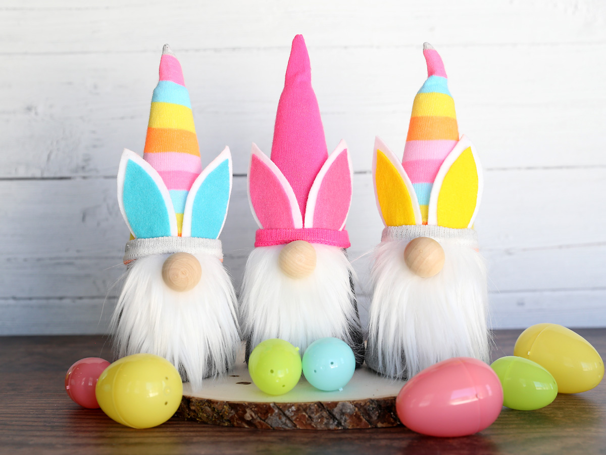 Three DIY Easter gnomes with plastic Easter eggs