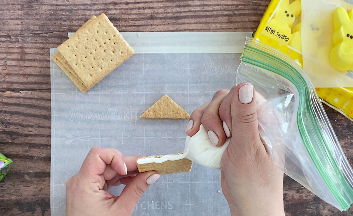 How to make a peeps house: use royal icing to "glue" pieces together