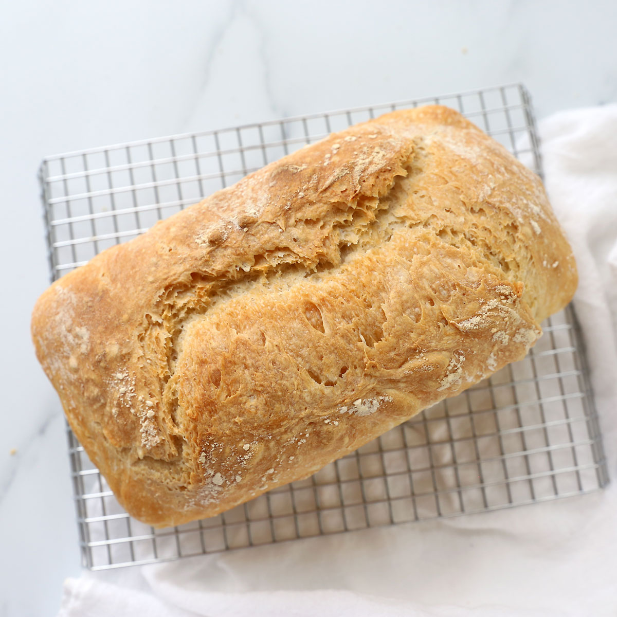 Easy artisan bread recipe baked in a loaf pan