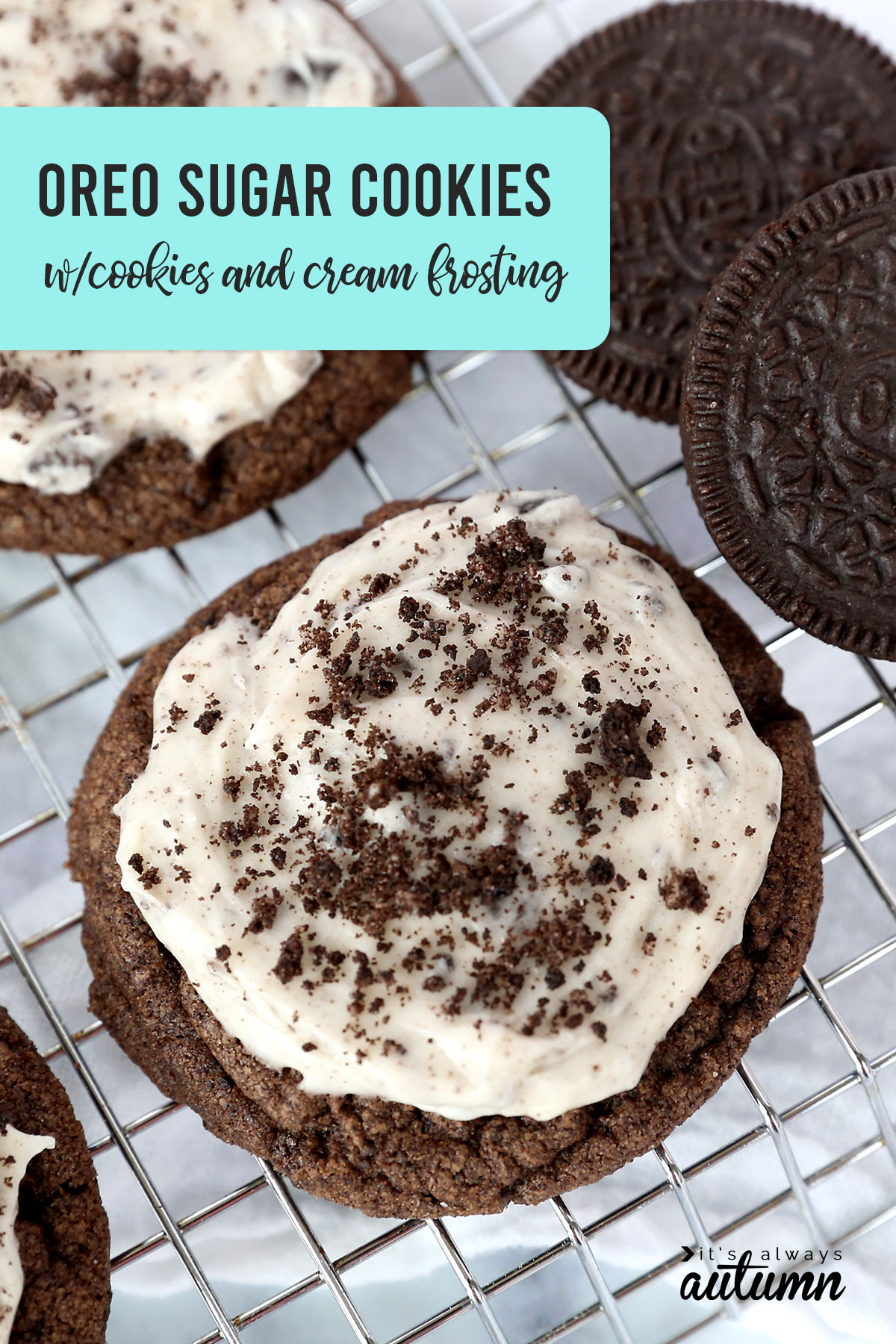 Oreo Sugar cookies on a cooling rack with cookie and cream frosting