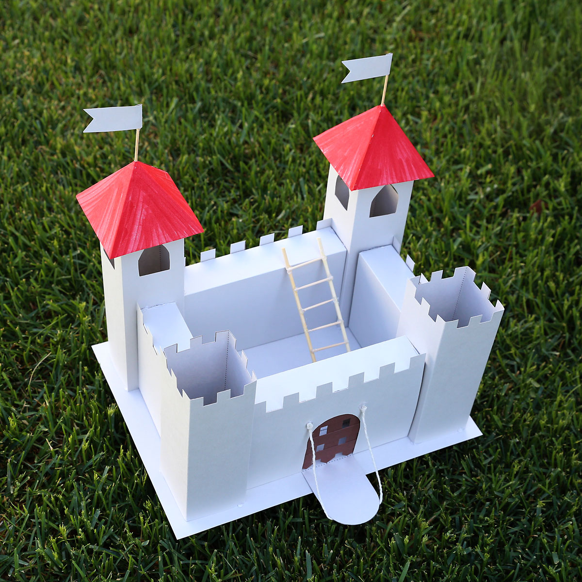 Paper castle sitting on the grass