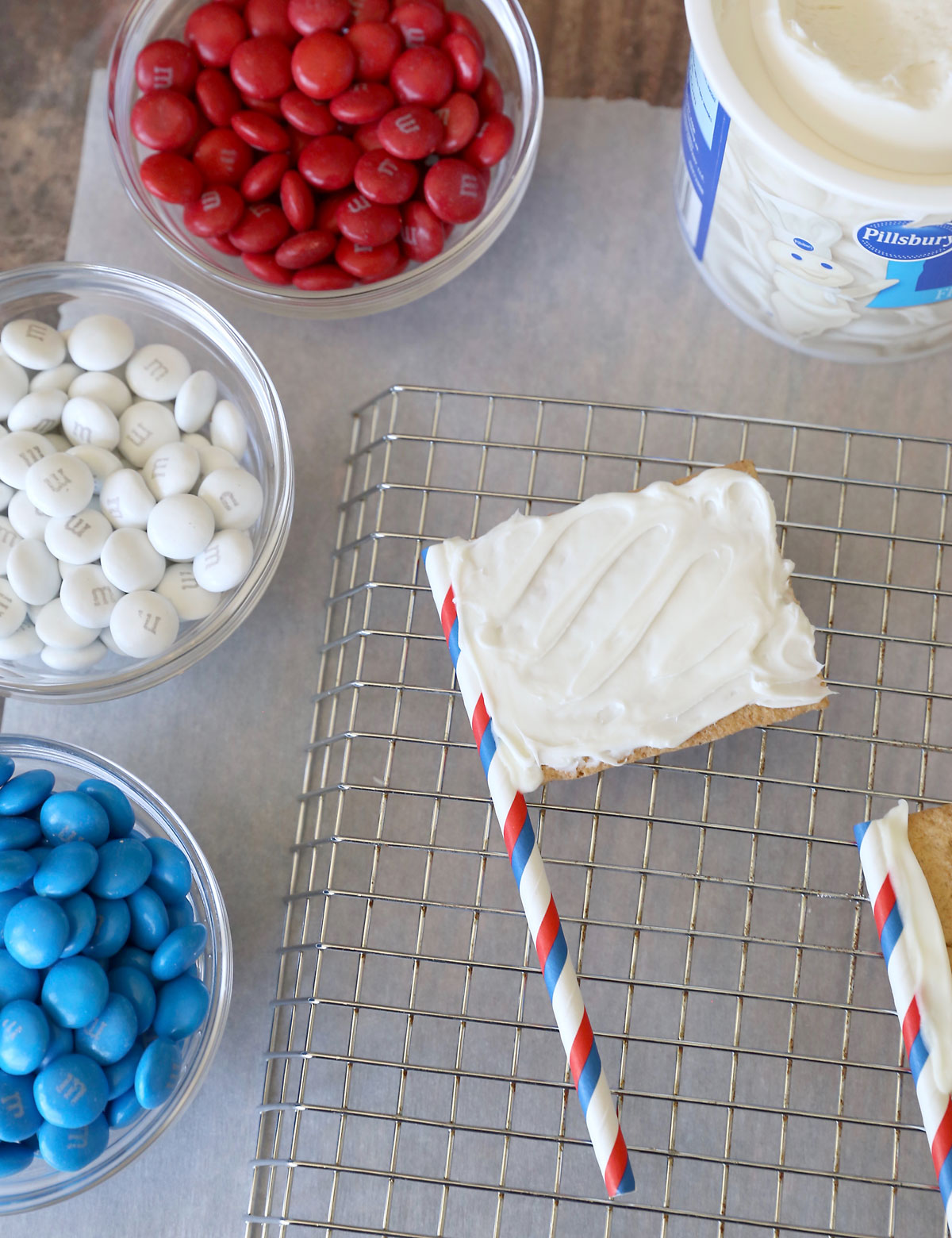 Graham cracker with frosting on it